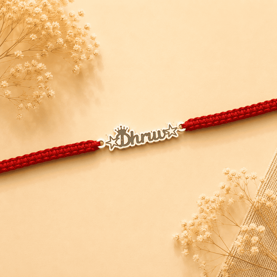 name with crown and star rakhi_925 silver rakhis_rakhis for raksha bandhan_rakhis_gifts_raksha bandhan_special rakhis_brother sister gifts 925 SILVER DESIGNER RAKHI WITH STARS & CROWN - Image 1